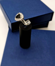 Load image into Gallery viewer, 3ct Trillion Cut Onyx with a White Sapphire Halo